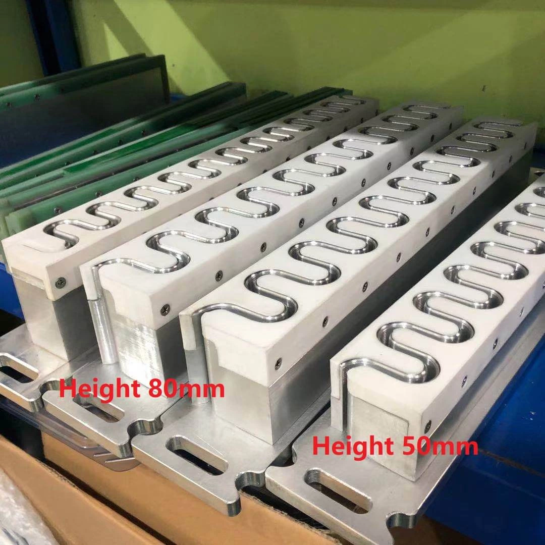 Moldes de guías, paredes laterales y perfiles para bandas transportadoras para soldadura de banda de alta frecuencia