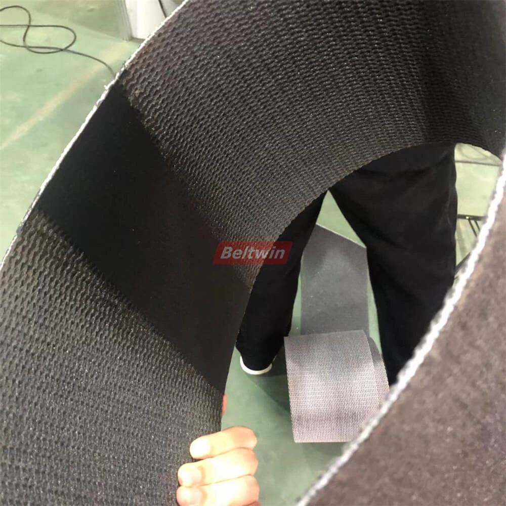 Cómo empalmar una correa de PVK mediante una prensa de refrigeración por aire y una perforadora automática de dedos-1