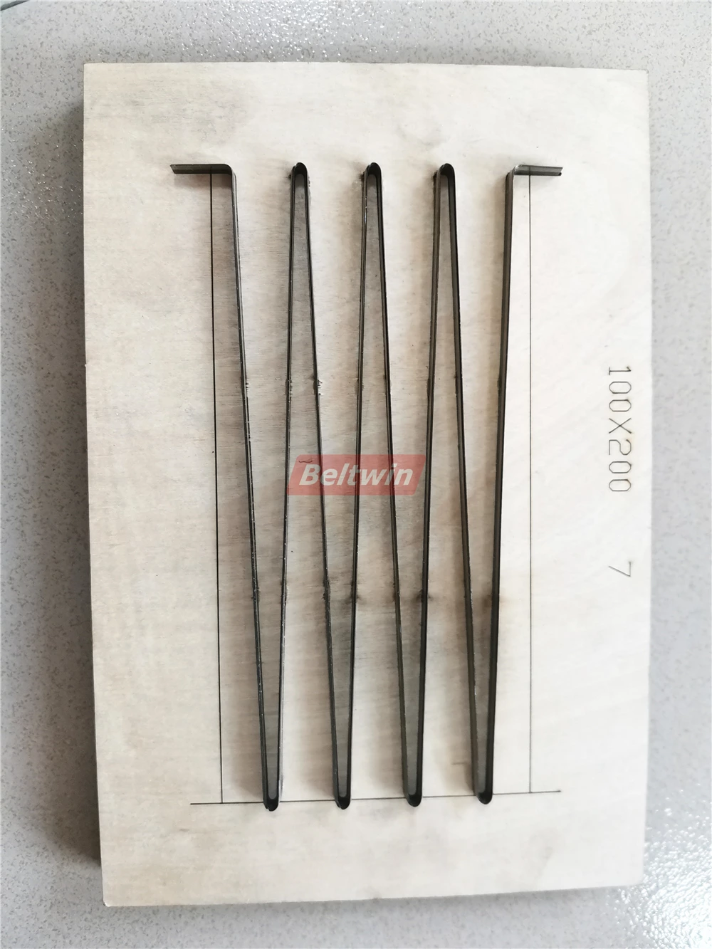 Punzonadora de dedo de correa dentada